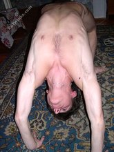 Hairy cock twink showing off his flexibility on the floor