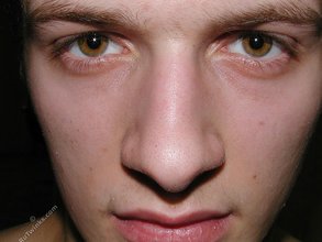 Big-dicked twink shows off his hairy cock on cam