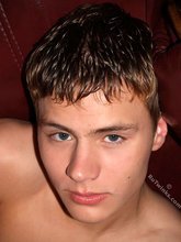Beautiful twink with a slightly hairy cock posing