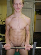 Jacked-up twink pumping iron totally naked