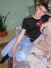 Twink hugs a wall and takes off his shirt
