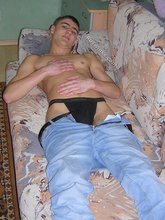 Gorgeous brunette twink revealing his black undies