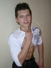 Twisted twink brunette shows off his six pack
