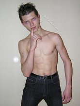 Twisted twink brunette shows off his six pack