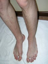 Dark-haired hottie and his soles in the spotlight