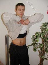 Sensual and street-smart twink shows his torso