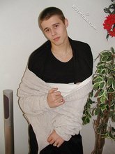 Sensual and street-smart twink shows his torso