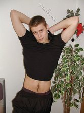 Sensual and street-smart twink shows his torso
