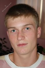 Blue-eyed blonde beauty takes off his striped shirt