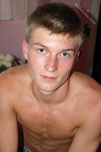 Blue-eyed blonde beauty takes off his striped shirt