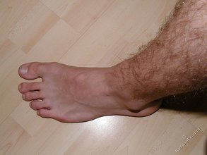Hairy cock twink shows his sexy feet to the viewer
