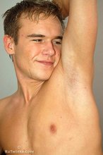 Jacked-up twink showing off his hairless armpits and ass