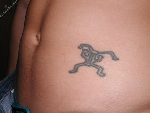 Blue-eyed twink shows his tattoos and hairy armpits