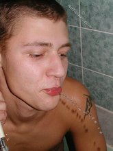 Twink licks his own armpits and showers on camera