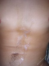Hairy cock twink cums hard on his own belly