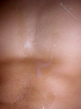 Hairy cock twink cums hard on his own belly