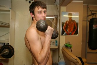 Frail twink lifts weights and brutalizes this punching bag