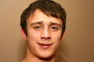 Cheerful twink showing his asshole from down below