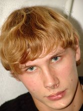 Redheaded hottie taking off his baggy sweater