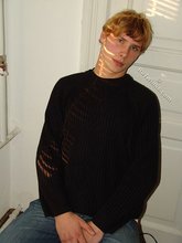 Redheaded hottie taking off his baggy sweater