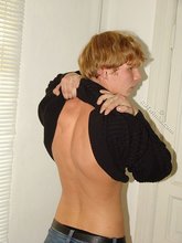 Redheaded hottie taking off his baggy sweater