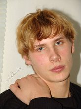 Redheaded hottie taking off his baggy sweater