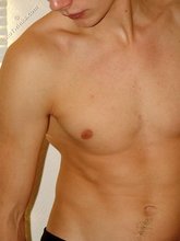 Blue-eyed redhead strips down to his sexy undies