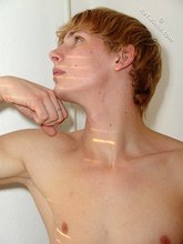 Blue-eyed redhead strips down to his sexy undies