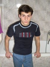 Dark-haired twink takes off his underwear in the bathroom
