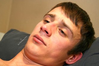 Dark-haired guy gets on all fours, showing his ass