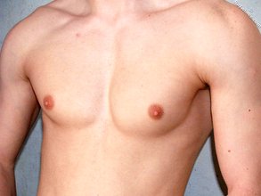 Blue-eyed twink takes off his shirt and shows his pits