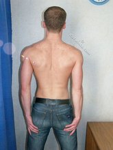 Blue-eyed twink takes off his shirt and shows his pits