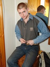 Denim-loving guy posing outdoors, looking mean/lean