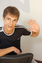 Black t-shirt dark-haired dude showing his body
