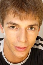 Black t-shirt dark-haired dude showing his body