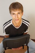 Black t-shirt dark-haired dude showing his body