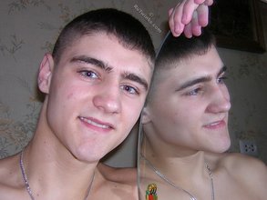 Blue-eyed brunette dude licking his own armpits