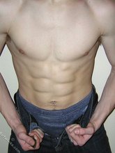 Spiked hair seductive twink showing his ass