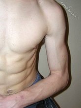 Spiked hair seductive twink showing his ass