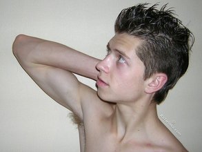 Spiked hair seductive twink showing his ass