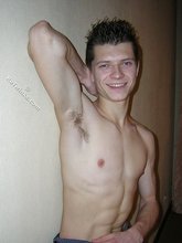 Spiked hair seductive twink showing his ass