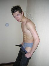Spiked hair seductive twink showing his ass