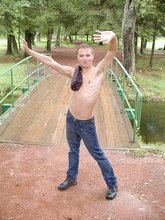 Blonde guy showing his sexy body outdoors