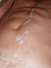 Six-pack twink cums all over his belly on cam