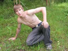 Blond-haired hottie gets naked in the forest