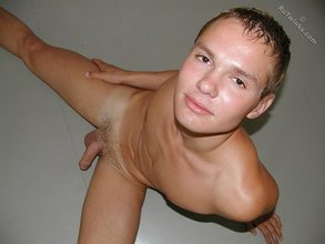 Blond-haired twink flashing his beautiful cock on cam