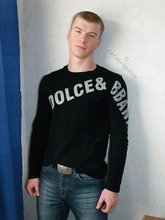 Black shirt stylish blue-eyed twink shows off his abs