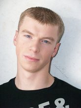 Black shirt stylish blue-eyed twink shows off his abs