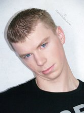 Black shirt stylish blue-eyed twink shows off his abs