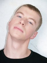 Black shirt stylish blue-eyed twink shows off his abs